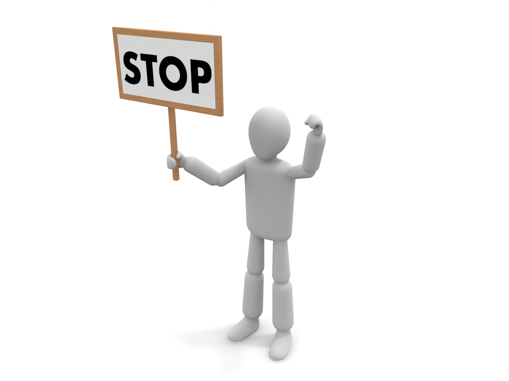 An illustration of a white 3D person holding a sign that says "STOP". An image that calls attention and encourages stopping.