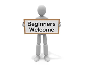 Beginners Welcomeと書かれた看板を正面に掲げている白い3Dの人物