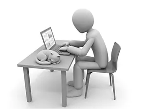 デスクでパソコン作業をする人物の横で眠る猫のイラスト