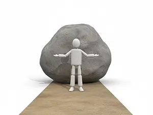 3D man standing blocked by a huge rock obstacle