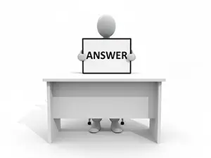 3D man sitting at a desk and holding up a signboard reading ANSWER