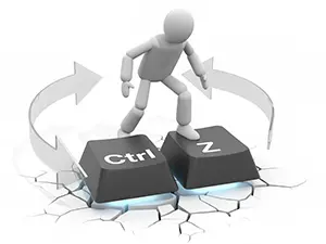 CtrlとZのキーボードの上に立ちやり直しをイメージさせる3D人物